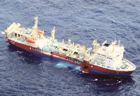 Oil slick from sunken ship speading